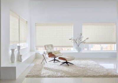 Light colored Woven wood shades in beautiful bright minimalistic room